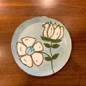 White Floral Plate Light Blue Background